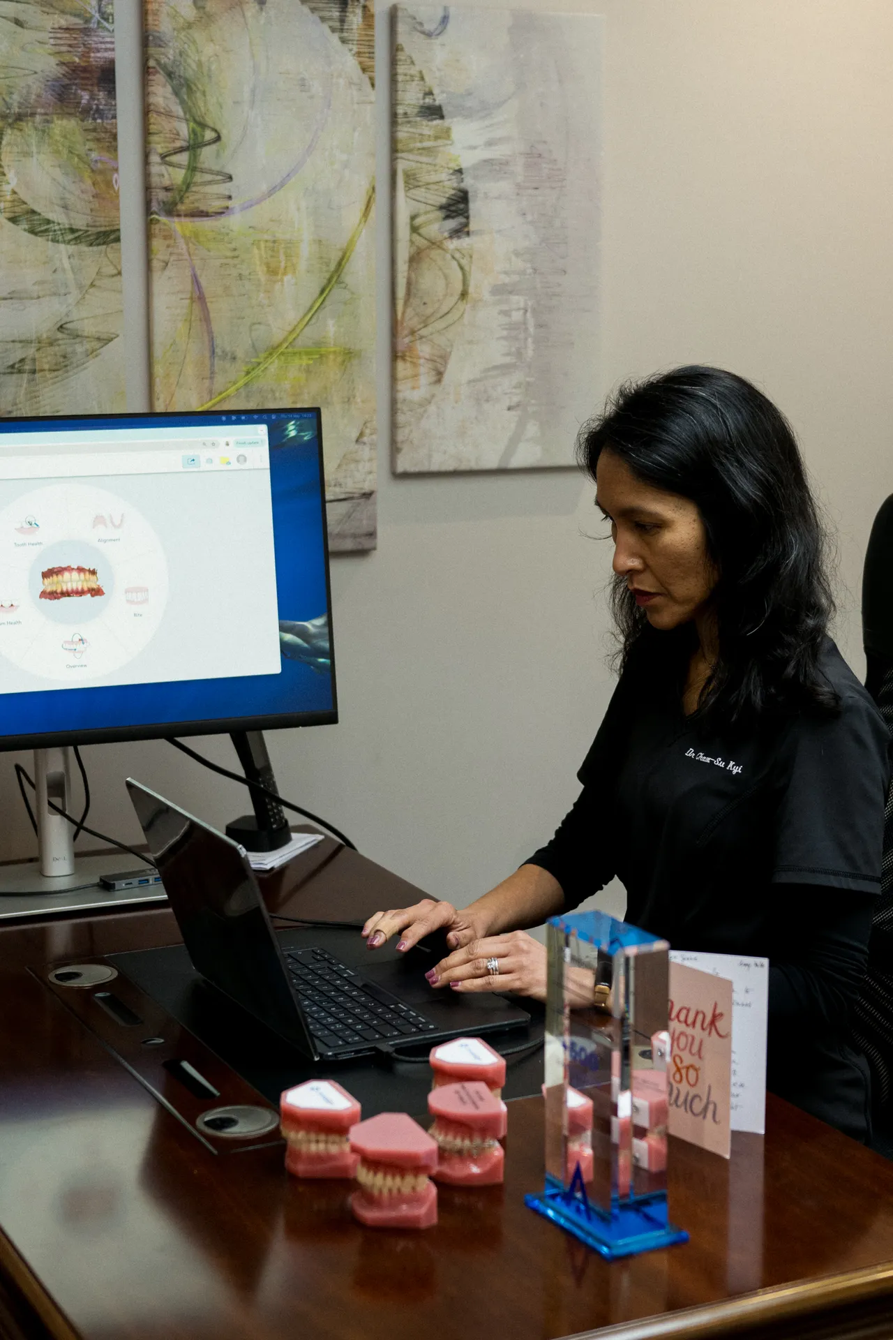 A patient in consultation with Dr Kyi at West London Orthodontist
