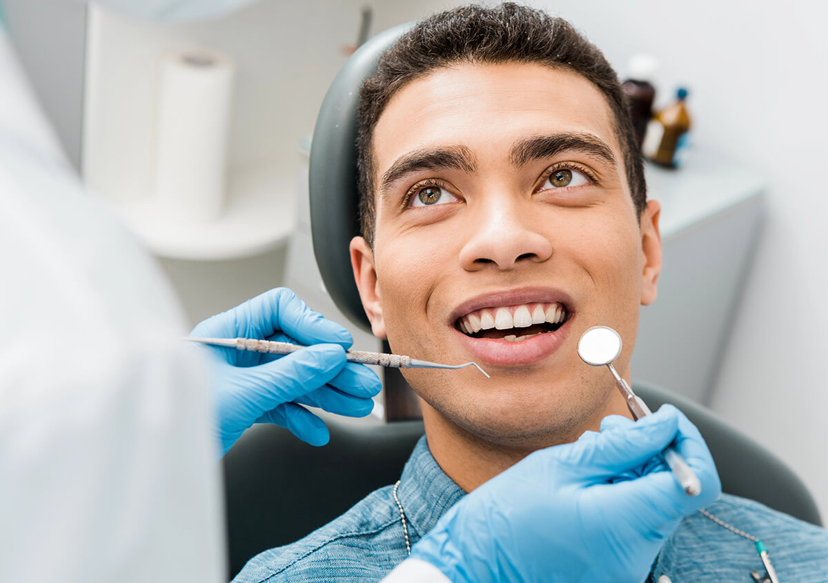 Close-up of healthy gums and teeth illustrating gum disease treatment at West London Orthodontist